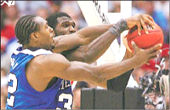 Memphis Joey Dorsey, left, predicted he would have a 15-point, 20-rebound game against Ohio States Greg Oden. He came up 15 points and 17 rebounds short... 