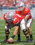 Look at the picture of Jim Cordle (64) snapping the football and figure out what's out of whack. 