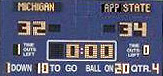 The final score on the Big House scoreboard says it all