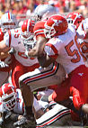 Ohio State's Chris Wells tries to escape the grasp of Youngstown States Lenny Wicks during the third quarter of Saturdays game in Columbus. Wells rushed for a touchdown and gained 46 yards on 16 carries.