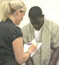 Antonio Henton appears in Franklin County Municipal Court this morning. At left is attorney Tasha Ruth.