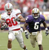 Washington's Vonzell McDowell Jr. (6) chases Ohio State's Brian Robiskie on a 68-yard pass reception for a touchdown early in the second half of a college football game Saturday, Sept. 15, 2007, in Seattle. Ohio State won 33-14.