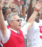 Jim Tressel and the team sing Carmen Ohio after defeating Washington