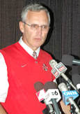 Jim tressel addresses the media after the Buckeyes defeat Washington 33-14