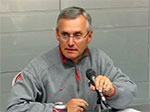 Coach Tressel speaks to the media