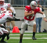 Wisconsin's Elijah Hodge gets a hand on Ohio State University quarterback Todd Boeckman as he scrambles free in the second quarter at Ohio Stadium on Saturday Nov. 3, 2007, in Columbus, Ohio. Ohio State beat Wisconsin 38 -17.