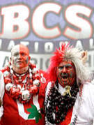 Jon Peters, AKA Big Nut, left, from Fremont, Ohio, and Larry Lokah, AKA Buckeye Man, from Urbana, Ohio, stand outside the the Louisiana Superdome before the BCS Championship game between Ohio State and LSU.