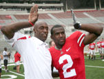 Former Olympic gold medalist Butch Reynolds, shown here with Macolm Jenkins, might work with entire Ohio State athletic department