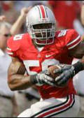 Ohio State defensive lineman Vernon Gholston returns a fumble against Northwestern in September. Heading into Ohio State's showdown for the national title against LSU on Monday, the 6-foot-4, 260-pound junior has tied the record for most sacks in a season by a Buckeye, matching Mike Vrabel's mark of 13.