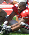 Beanie Wells grimaces in pain after sustaining a foot injury early in the third quarter. Photo by Dan Harker The Ozone