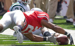 Shaun Lane makes the play of the game versus OU- Photo The Ozone