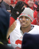 OSU's Terrelle Pryor celebrates with fans after defeating Illinois 30-20 in Champaign, Ill., Saturday, Nov. 15, 2008. (AP Photo/Seth Perlman)