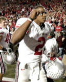 A triumphant Terrelle Pryor jogged off the field after the Buckeyes finished off their 20-17 victory over Wisconsin Saturday night. Pryor passed for 144 yards and ran for another 20 and his 11-yard option TD run decided the game with 68 seconds remaining.(Andy Manis/Associated Press)