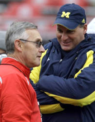 
Michigan head coach Rich Rodriguez meets with Ohio State head coach Jim Tressel before an NCAA college football game Saturday, Nov. 22, 2008 in Columbus, Ohio. (AP Photo/Kiichiro Sato)