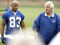 Roy Hall (83) walks off the practice field with Colts offensive coordinator Tom Moore