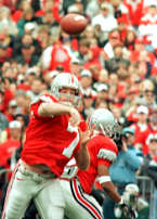 OSU quarterback Joe Germaine fires one of his 28 passes, as running back Michael Wiley protects his blind side, during the Buckeye's 31-16 victory over Michigan, at Ohio Stadium, in Columbus, Ohio, on Saturday, Nov. 21, 1998. Germaine was 16 of 28 for 330 yards and 3 TD's. 